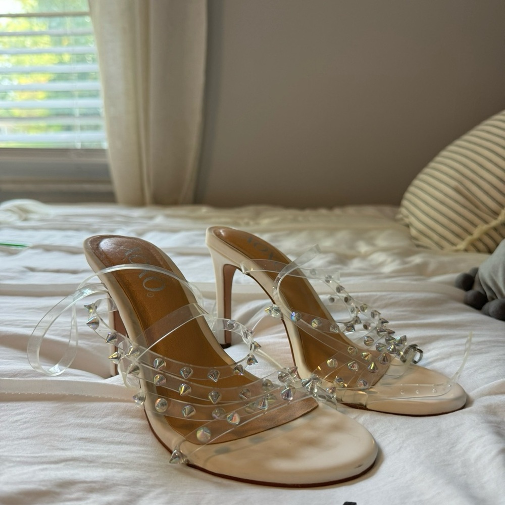 White heels with clear straps